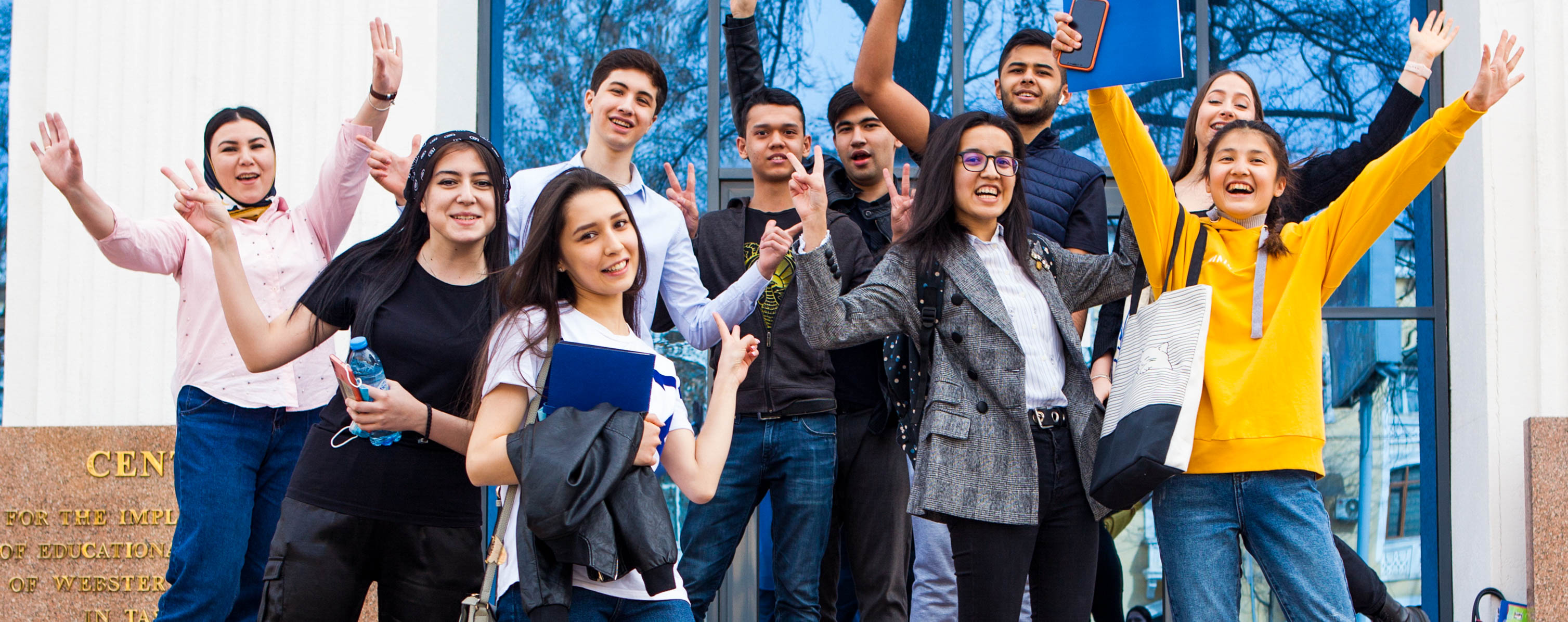 photo of students smiling and happy to be at Webster University
